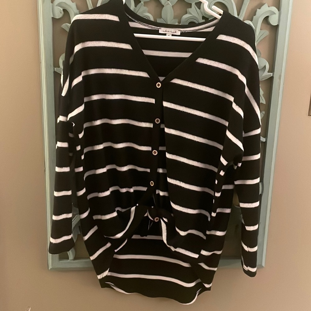button down long sleeve. ties at the bottom. great condition
